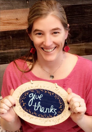 Niki Pacheco holding a give thanks