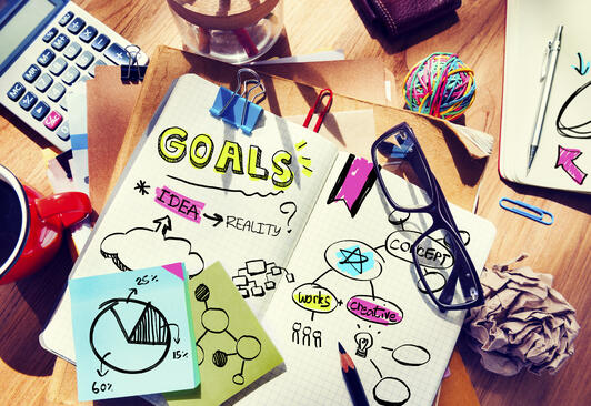 goals written on the notebook