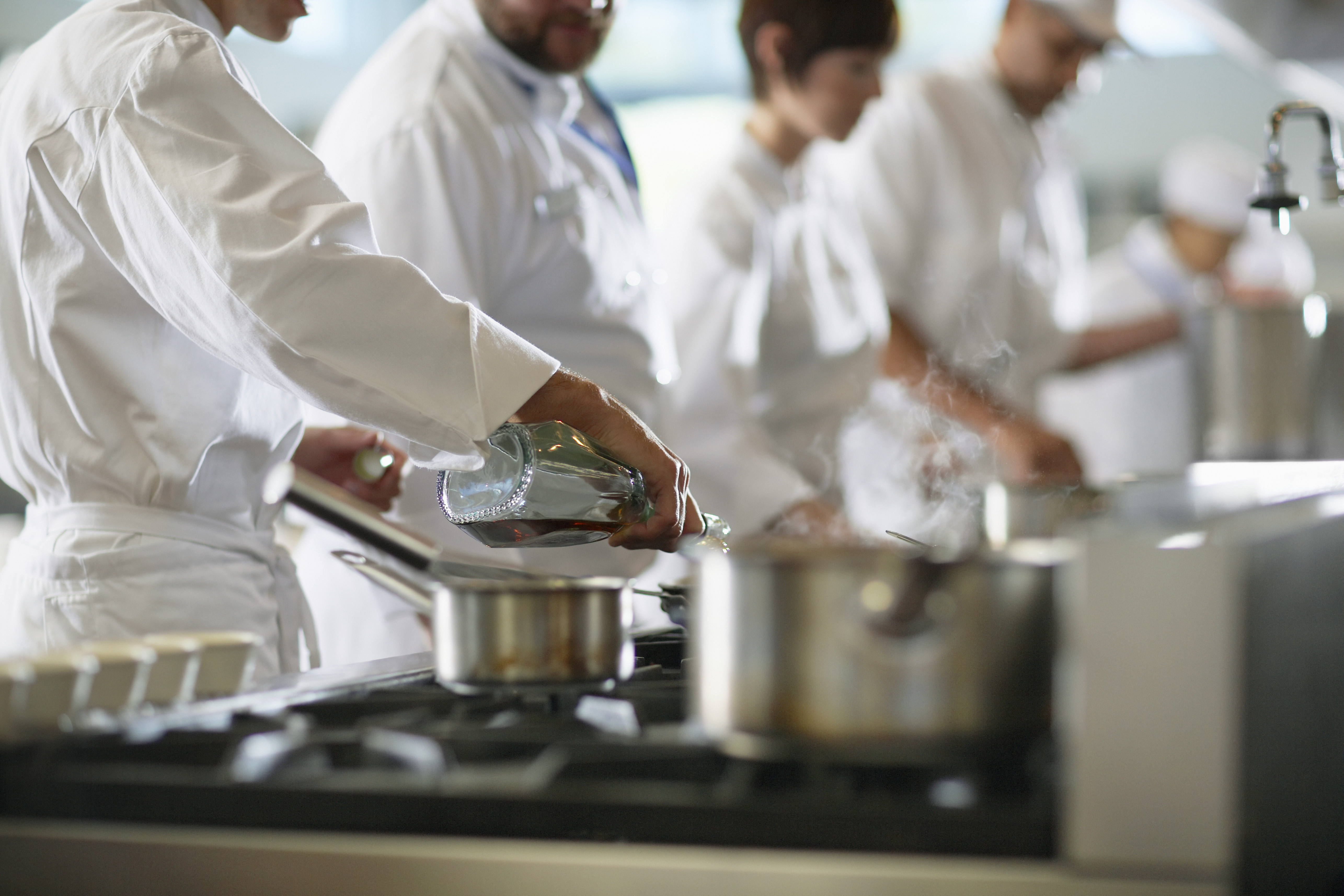 chefs busy cooking their own menu