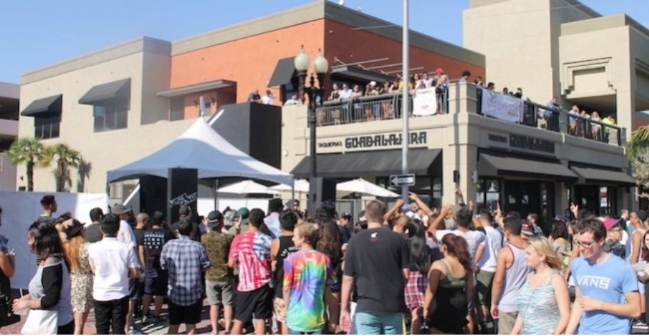 people gathered in front of a restaurant