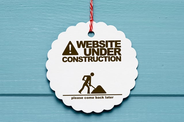 website under construction cartoon image