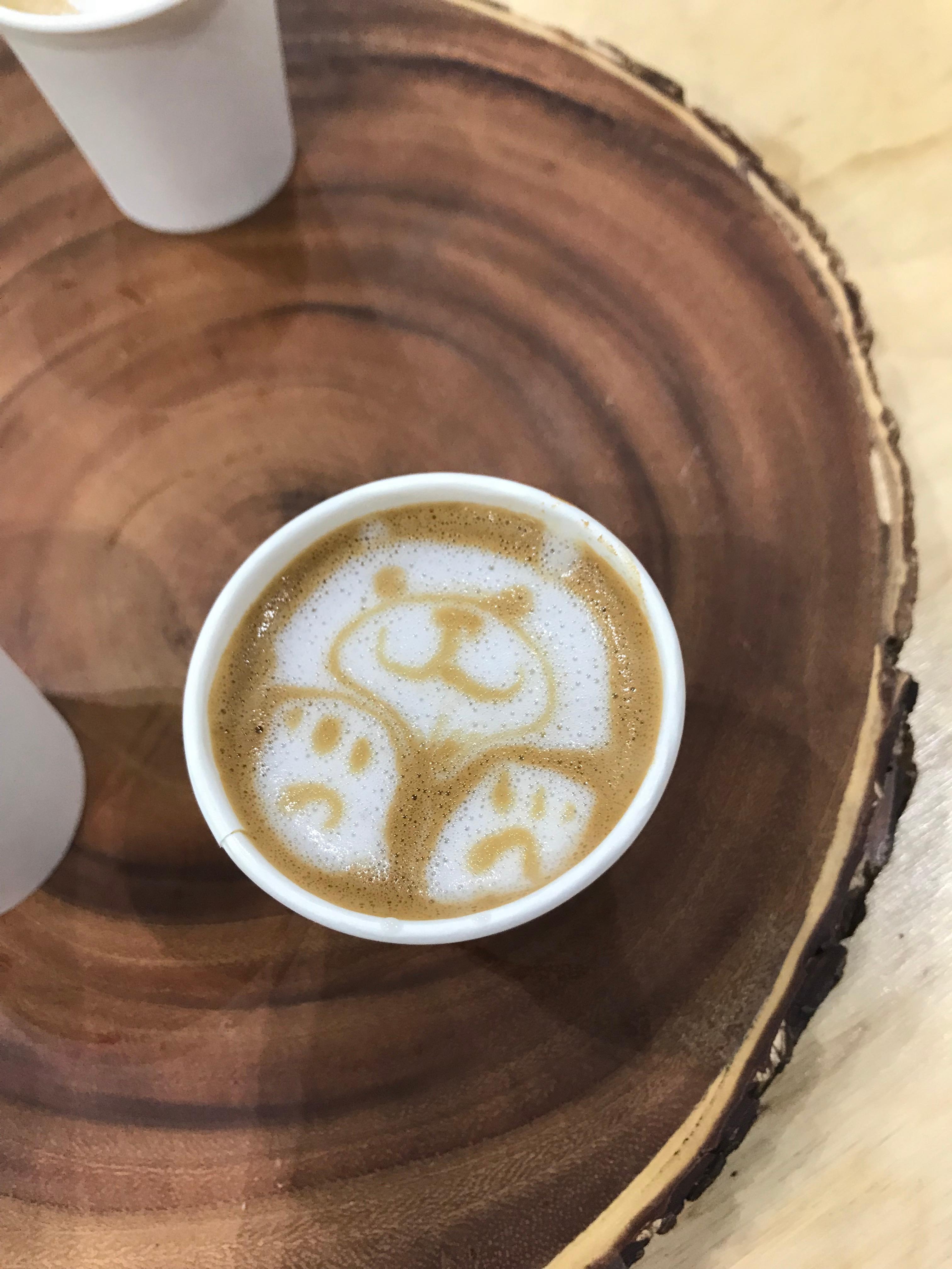 Cup of coffee on a wooden table