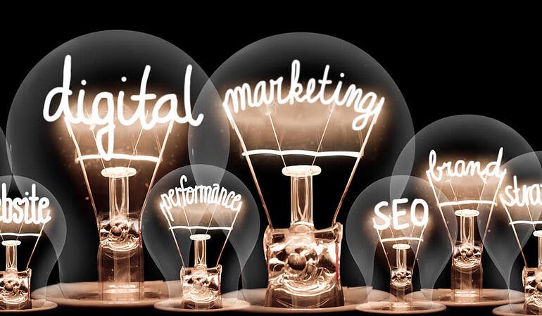 Bulbs with digital marketing text on it