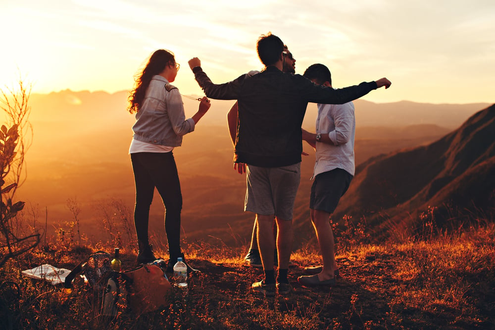 Friends on top of a mountain