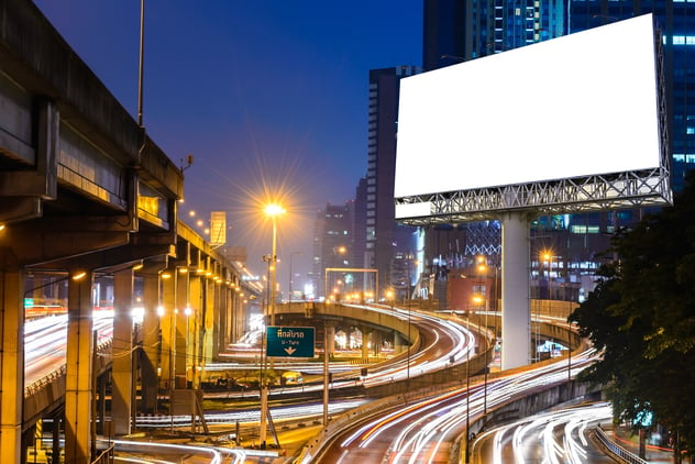 blank billboard on a busy city