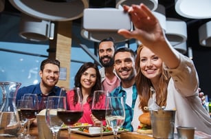 An group of people taking selfie