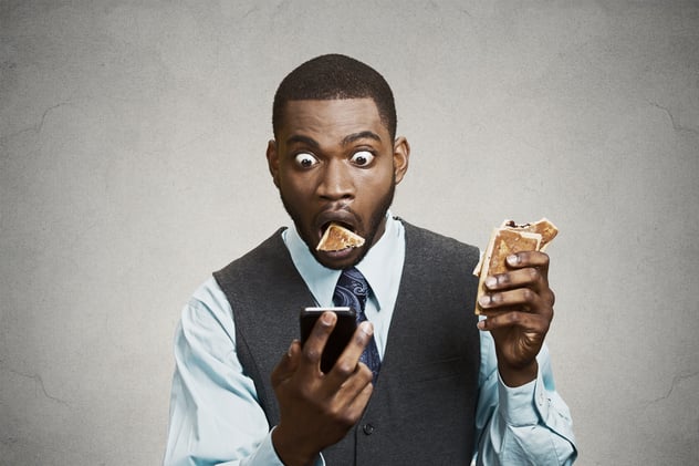 man shocked reaction with a bread on his mouth